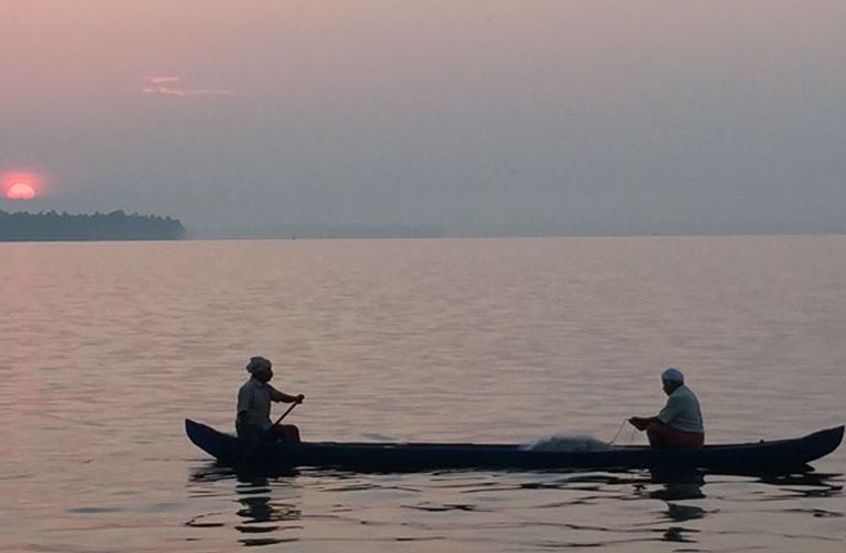 sunset and boat india